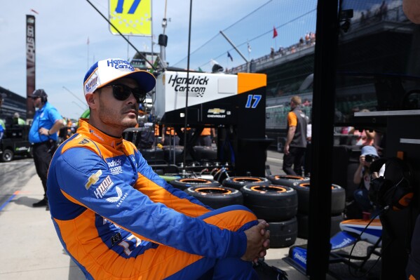 Kyle Larson waits in his pit box during a practice session for the Indianapolis 500 auto race at Indianapolis Motor Speedway, Monday, May 20, 2024, in Indianapolis. (AP Photo/Darron Cummings)