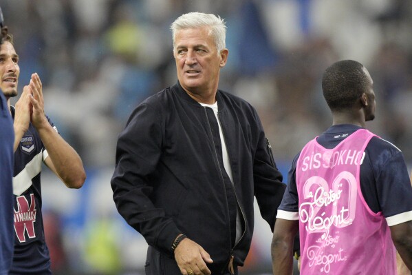 FILE - Bordeaux's head coach Vladimir Petkovic reacts after the French League One soccer match between Marseille and Bordeaux at the Velodrome stadium in Marseille, southern France, Aug. 15, 2021. The coach who led Switzerland to eliminate then-world champion France at the last European Championship has been hired to coach Algeria. The Algerian soccer federation says it reached agreement on the job with Vladimir Petkovic and he will arrive in Alger at the weekend for a news conference scheduled Monday. (AP Photo/Daniel Cole, File)