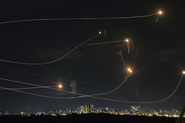 Israeli Iron Dome air defense system fires to intercept a rocket fired from the Gaza Strip, in Ashkelon, Israel, Friday, Oct. 20, 2023. (AP Photo/Avi Roccah)