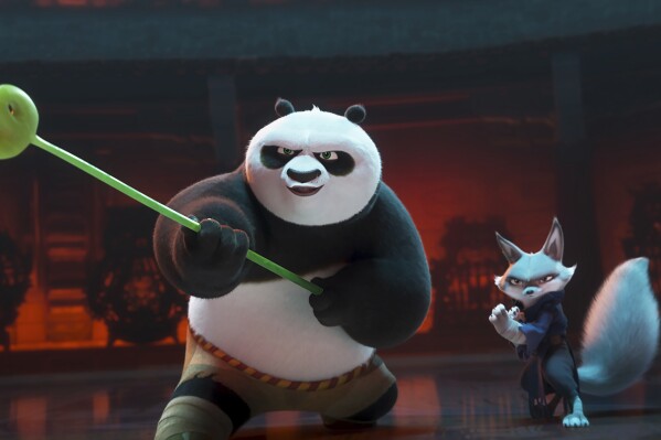 This image released by Universal Pictures shows characters Po, voiced by Jack Black, left, and Zhen, voiced by Awkwafina, in a scene from DreamWorks Animation's "Kung Fu Panda 4." (DreamWorks Animation/Universal Pictures via AP)