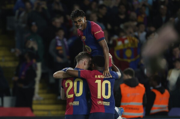 Barcelona increases Spanish league lead by beating Mallorca 1-0 on Dani  Olmo's goal | AP News
