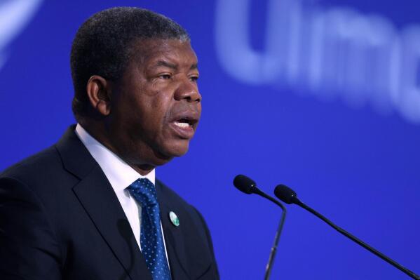 FILE — Angola's President Joao Lourenco speaks during the UN Climate Change Conference COP26 in Glasgow, Scotland, Tuesday, Nov. 2, 2021. Angola — one of Africa's largest oil producers — is preparing for a general election Wednesday, Aug. 24, 2022 and voters are debating whether they should vote and sit at the polling stations to monitor the process or cast their ballots and go home. (Adrian Dennis/Pool Photo via AP)