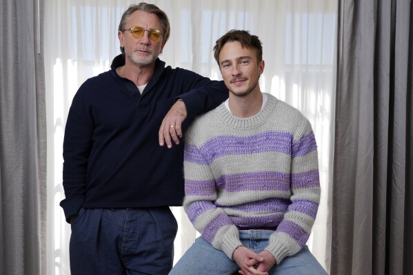 Daniel Craig, left, and Drew Starkey, cast members in the film "Queer," pose together for a portrait to promote the film on Wednesday, Nov. 13, 2024 in Los Angeles. (AP Photo/Chris Pizzello)