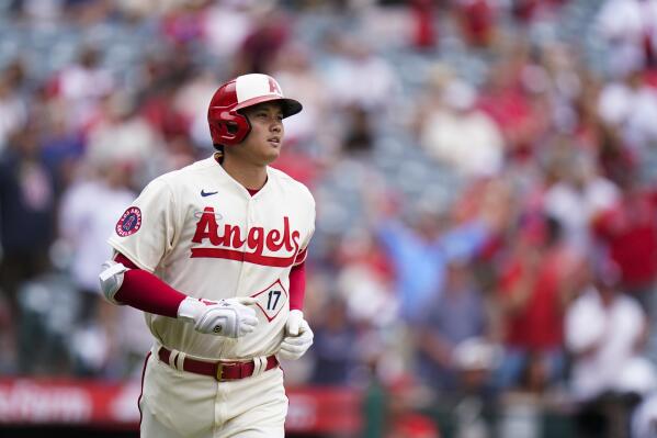 Los Angeles Angels' Shohei Ohtani runs the bases after hitting a home run against the Oakland Athletics, his second homer of the baseball game, during the seventh inning Thursday, Aug. 4, 2022, in Anaheim, Calif. (AP Photo/Jae C. Hong)