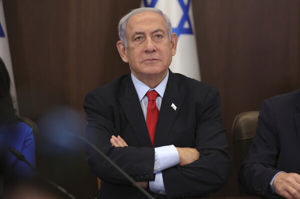 Israeli Prime Minister Benjamin Netanyahu attends the weekly cabinet meeting at the prime minister's office in Jerusalem, Israel, Sunday, July 30, 2023. (Abir Sultan/Pool Photo via AP)