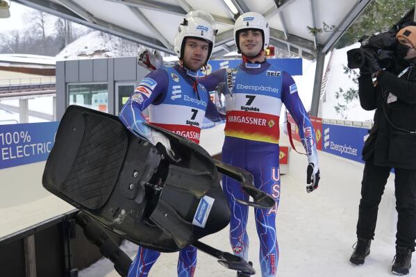 Zachary Di Gregorio and Sean Hollander of United States after their second run at the Luge World Cup men doubles race in Sigulda, Latvia, Saturday, Jan. 8, 2022. (AP Photo/Roman Koksarov)