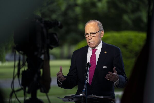 FILE - In this May 8, 2020, file photo White House chief economic adviser Larry Kudlow speaks during an interview on the unemployment numbers caused by the coronavirus, at the White House in Washington. Some of Trump’s top economic advisers emphasized on Sunday, May 10, the importance of states getting more businesses and offices open. (AP Photo/Evan Vucci, File)