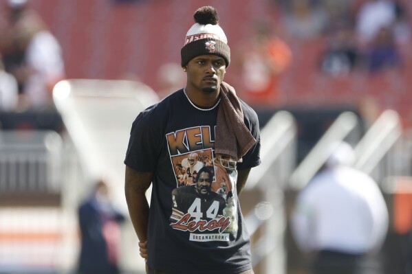 Cleveland Browns quarterback Deshaun Watson stands on the field before an NFL football game against the Baltimore Ravens, Sunday, Oct. 1, 2023, in Cleveland. (AP Photo/Ron Schwane)