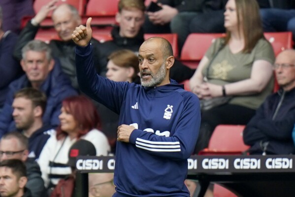Nottingham Forest manager Nuno Espirito Santo gestures, during the English Premier League soccer match between Sheffield United and Nottingham Forest, at Bramall Lane, in Sheffield, England, Saturday, May 4, 2024. (Danny Lawson/PA via AP)