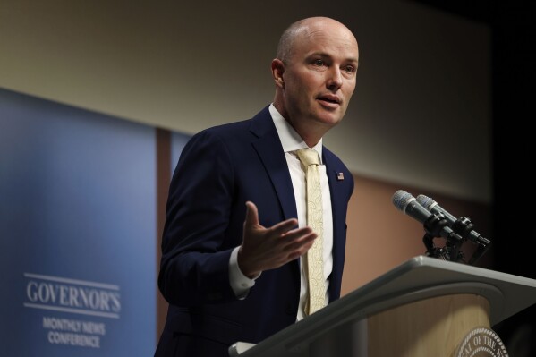 FILE - Utah Gov. Spencer Cox speaks at the PBS Utah Governor's Monthly News Conference at the Eccles Broadcast Center in Salt Lake City, Oct. 19, 2023. Cox signed a bill into law Tuesday, Jan. 30, 2024, that makes the state the latest to prohibit diversity training, hiring and inclusion programs at universities and in state government. (Laura Seitz/The Deseret News via AP, Pool, File)