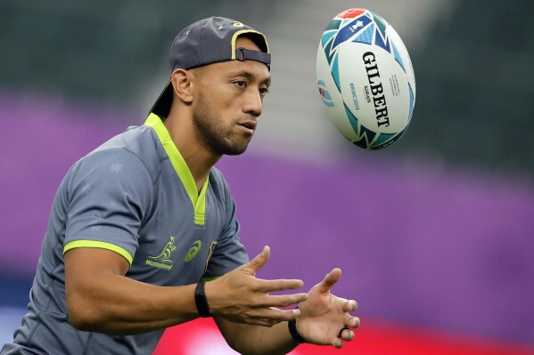 FILE - Australia's Christian Leali'ifano catches the ball during a training session in Oita, Japan, on Oct. 18, 2019. Former Australia international Christian Leali’ifano will start at flyhalf for Samoa when it opens its Rugby World Cup campaign against Chile on Saturday, Sept. 16, 2023. (AP Photo/Christophe Ena, File)