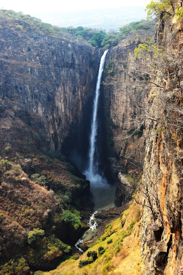 This photo provided by researchers shows Kalambo Falls in Zambia in 2019. A pair of crossed logs found on a riverbed nearby may be the oldest evidence of early humans building with wood, nearly half a million years old, according to a study published Wednesday, Sept. 19, 2023 in the journal Nature. (Geoff Duller/Aberystwyth University via AP)