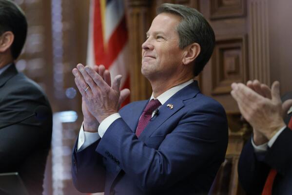 FILE - Georgia Gov. Brian Kemp delivers the State of the State address on the House floor of the state Capitol, Jan. 25, 2023, in Atlanta. The state Senate voted 50-1 on Tuesday, March 7, to pass a bill that would allow some pregnant women to apply for cash aid, a proposal that the Republican Kemp has backed. (AP Photo/Alex Slitz, File)