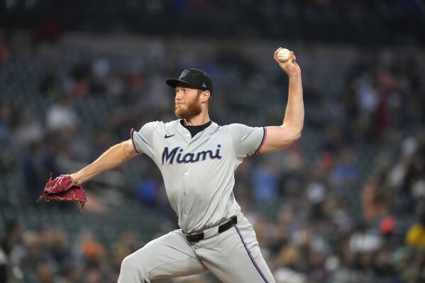 Miami Marlins relief pitcher A.J. Puk throws during the tenth inning of a baseball game against the Detroit Tigers, Tuesday, May 14, 2024, in Detroit. (AP Photo/Carlos Osorio)
