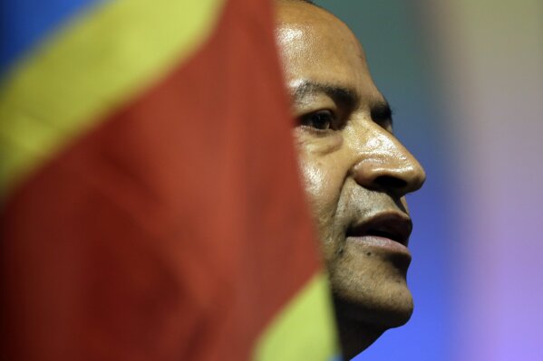 
              FILE - In this Monday, March 12, 2018 file photo, Congolese opposition leader Moise Katumbi speaks to delegates at a three-day forum in a resort hotel near Johannesburg, South Africa. Katumbi is expected to return to Congo on Monday May 20, 2019, one of a number of political exiles coming home after a new president took office this year. (AP Photo/Themba Hadebe, File)
            