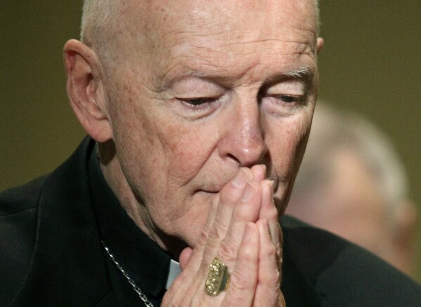 In this Nov. 14, 2011 file photo, Cardinal Theodore McCarrick prays during the United States Conference of Catholic Bishops’ annual fall assembly in Baltimore. (AP Photo/Patrick Semansky, File)