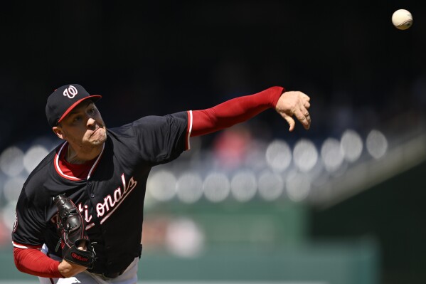Washington Nationals starting pitcher Patrick Corbin throws during the first inning of a baseball game, Wednesday, June 19, 2024, in Washington. (AP Photo/John McDonnell)