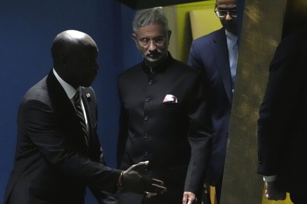 India's Foreign Minister Subrahmanyam Jaishankar is escorted to address the 78th session of the United Nations General Assembly, Tuesday, Sept. 26, 2023. (AP Photo/Richard Drew)