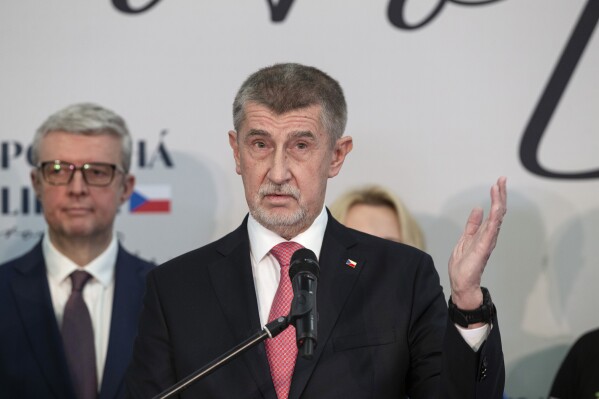 FILE - Presidential candidate and former Czech Republic's Prime Minister Andrej Babis, gestures as he speaks to members of the media, in Prague, Czech Republic, Saturday, Jan. 28, 2023. Prague’s High Court cancelled a lower court ruling that acquitted former Prime Minister Andrej Babis of fraud charges in a $2 million case involving European Union subsidies. (AP Photo/Marko Drobnjakovic, File)