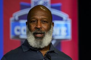 Houston Texans head coach Lovie Smith speaks during a press conference at the NFL football scouting combine in Indianapolis, Wednesday, March 2, 2022. (AP Photo/Michael Conroy)