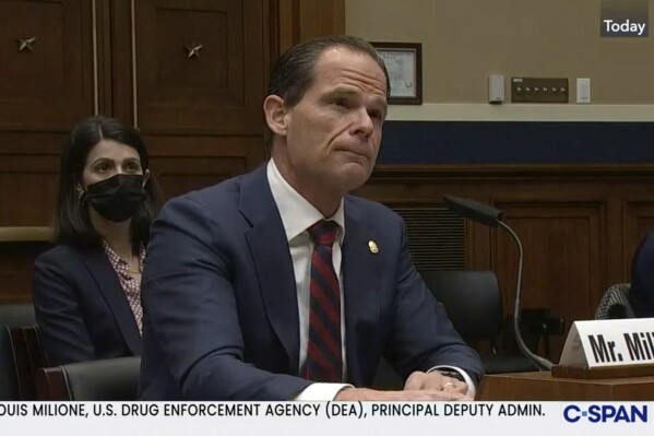 FILE - In this image from video provided by C-SPAN, Louis Milione, the U.S. Drug Enforcement Administration's principal deputy administrator, speaks during a hearing held by the House Energy and Commerce Subcommittee on Health in Washington on Dec. 2, 2021. Milione, the DEA’s second-in-command, quietly resigned in 2023, amid reporting by The Associated Press that he previously consulted for a pharmaceutical distributor sanctioned for a deluge of suspicious painkiller shipments and did similar work for the drugmaker that became the face of the opioid epidemic: Purdue Pharma. (C-SPAN via AP, File)