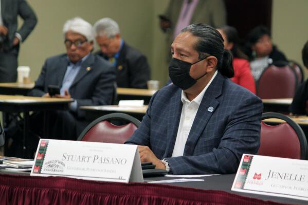 Sandia Pueblo Gov. Stuart Paisano asks congressional candidates how they would protect tribal water rights during a political forum hosted by the All Pueblo Council of Governors in Albuquerque, N.M., on Friday, Oct. 14, 2022. (AP Photo/Susan Montoya Bryan)