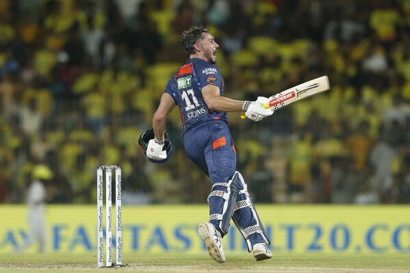 Lucknow Super Giants' Marcus Stoinis celebrates after scoring the winning runs in the Indian Premier League cricket match between Chennai Super Kings and Lucknow Super Giants in Chennai, India, Tuesday, April 23, 2024. (AP Photo/R.Parthiban)