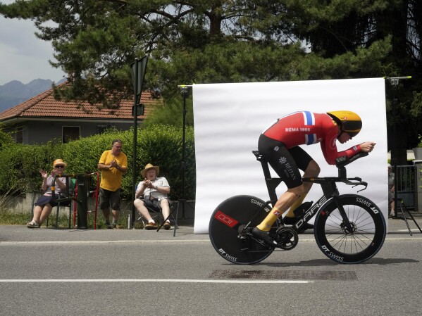 Soren Waereskjold from Norway rides during the sixteenth stage of the Tour de France cycling race, an individual time trial over 22.5 kilometers (14 miles) with start in Passy and finish in Combloux, France, Tuesday, July 18, 2023. (AP Photo/Thibault Camus)