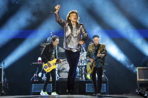 FILE - Mick Jagger of The Rolling Stones performs during the first night of the U.S. leg of their "Hackney Diamonds" tour on Sunday, April 28, 2024, in Houston. The New Orleans Jazz & Heritage Festival is usually akin to a 14-ring musical circus, but that changes Thursday afternoon, May 2, when 13 stages go silent before The Rolling Stones make their first appearance at the 54-year-old festival. (Photo by Amy Harris/Invision/AP, File)