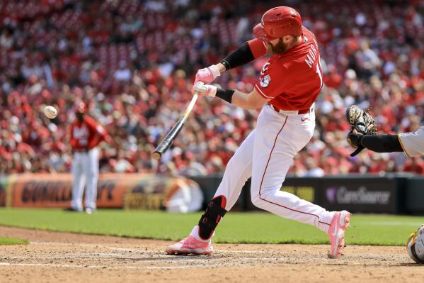 Cincinnati Reds' Colin Moran hits a grand slam during the sixth inning of a baseball game against the Pittsburgh Pirates in Cincinnati, Sunday, May 8, 2022. (AP Photo/Aaron Doster)
