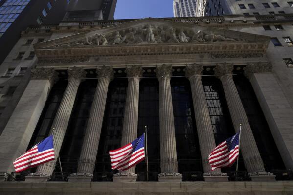 FILE - American flags fly outside the New York Stock Exchange, Friday, Sept. 23, 2022, in New York.  (AP Photo/Mary Altaffer, File)