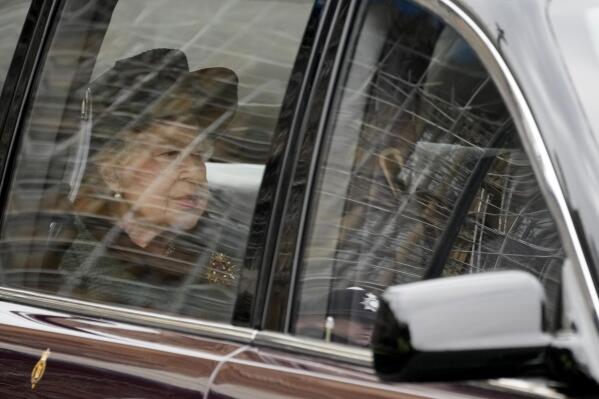 Britain's Queen Elizabeth II is driven in to attend a Service of Thanksgiving for the life of Prince Philip, Duke of Edinburgh at Westminster Abbey in London, Tuesday, March 29, 2022. (AP Photo/Frank Augstein)