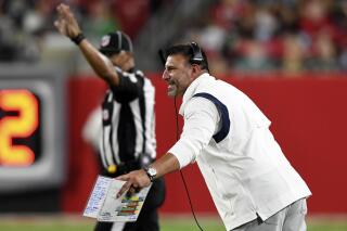 Tennessee Titans head coach Mike Vrabel reacts during the first half of an NFL preseason football game against the Tampa Bay Buccaneers Saturday, Aug. 21, 2021, in Tampa, Fla. (AP Photo/Jason Behnken)
