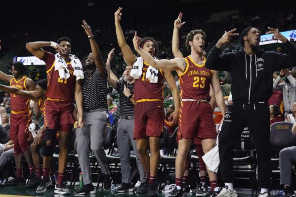 The Iowa State bench reacts on a score against Baylor in the second half of an NCAA college basketball game, Saturday, March 4, 2023, in Waco, Texas. (Chris Jones/Waco Tribune-Herald via AP)