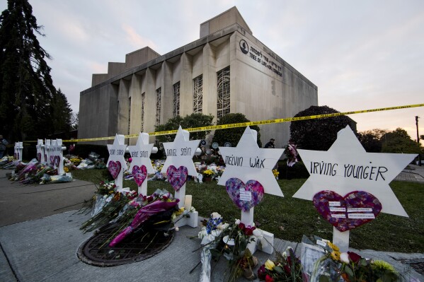 FILE - A makeshift memorial stands outside the Tree of Life Synagogue in the aftermath of a deadly shooting in Pittsburgh, Oct. 29, 2018. More than a week after convicting a gunman in the deadliest antisemitic attack in U.S. history, jurors will begin hearing arguments in federal court Monday, June 26, 2023, about whether he should receive the death penalty for killing 11 worshippers inside the Pittsburgh synagogue. (AP Photo/Matt Rourke, File)