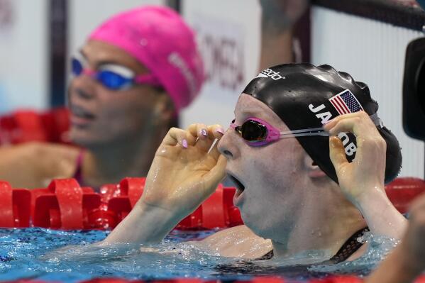 Lydia Jacoby of the United States, sees the results after winning the final of the women's 100-meter breaststroke at the 2020 Summer Olympics, Tuesday, July 27, 2021, in Tokyo, Japan. (AP Photo/Martin Meissner)