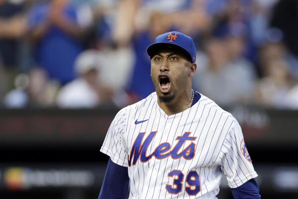New York Mets pitcher Edwin Diaz reacts after the final out during the top half of the eighth inning of the team's baseball game against the Los Angeles Dodgers on Thursday, Sept. 1, 2022, in New York. (AP Photo/Adam Hunger)