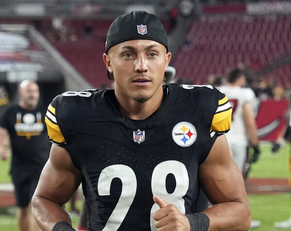 FILE - Pittsburgh Steelers safety Miles Killebrew jogs off the field the field following an NFL preseason football game against the Tampa Bay Buccaneers, Aug. 11, 2023, in Tampa, Fla. The Steelers signed Killebrew, an All-Pro as a special teamer last season, to a two-year deal Monday, March 18, 2024. (AP Photo/Peter Joneleit, File)