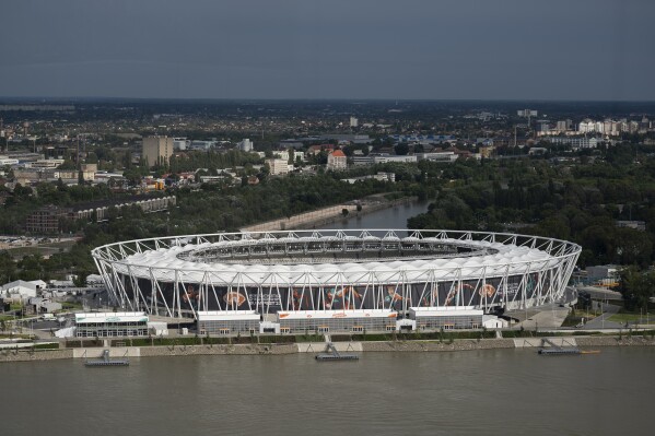 A view of Budapest's National Athletics Centre, on Wednesday, Aug. 9, 2023. A country with authoritarian leanings spends millions, maybe billions, to put itself on center stage in sports. It's hardly a new concept, though the country hosting this year's world championships is not China or Qatar or Russia. Rather, it's Hungary, which is bringing major events to its capital at a steady clip under the leadership of far-right prime minister Viktor Orban. Could this country of around 10 million be angling for an Olympics down the road, too? (AP Photo/Denes Erdos)
