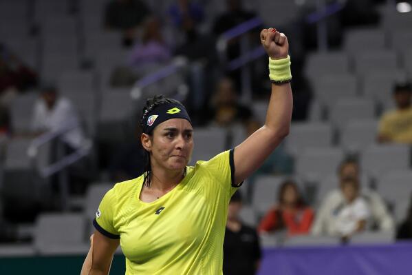 Ons Jabeur of Tunisia reacts after winning her match against Jessica Pegula during round robin-play on day three of the WTA Finals tennis tournament in Fort Worth, Texas, Wednesday, Nov. 2, 2022. Jabeur won 1-6, 6-3, 6-3. (AP Photo/Tim Heitman)