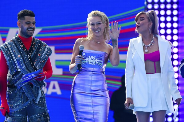 TV presenter and actress Anastasia Ivleeva, center, performs during VK Festival in Moscow, Russia, Saturday, July 15, 2023. Ivleeva hosted a bash at a Moscow nightclub with the stated dress code of 