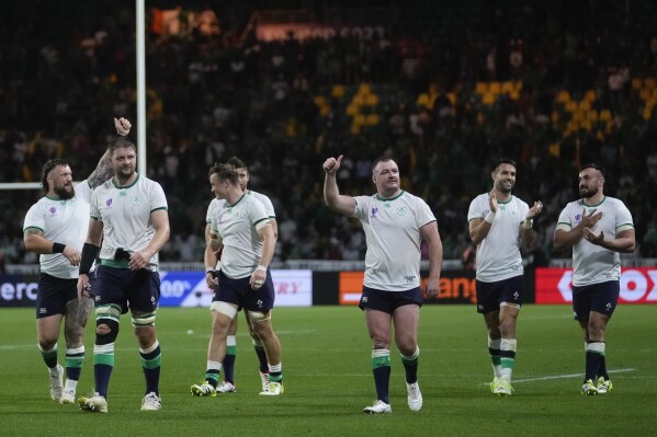 Ireland players gesture to supporters following the Rugby World Cup Pool B match between Ireland and Tonga at the State de la Beaujoire in Nantes, France Saturday, Sept. 16, 2023. (AP Photo/Thibault Camus)