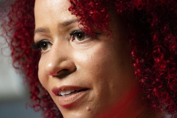 FILE - In this  July 6, 2021, file photo Nikole Hannah-Jones is interviewed at her home in the Brooklyn borough of New York. Hannah-Jones opted against teaching at the University of North Carolina after a protracted tenure fight centered on conservative objections to her work and instead chose Howard University, where she will hold the Knight Chair in Race and Journalism. (AP Photo/John Minchillo, File)