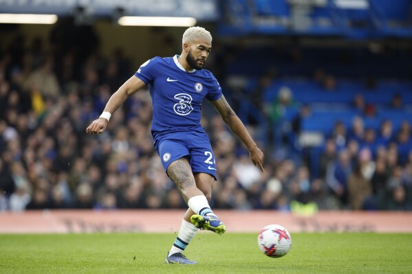 FILE -Chelsea's Reece James passes the ball during the English Premier League soccer match between Chelsea and Aston Villa at Stamford Bridge stadium in London, Saturday, April 1, 2023. Chelsea defender Reece James has been charged by the FA for an alleged altercation with a match official, English soccer's governing body said Wednesday, Sept. 27, 2023. The incident is said to have occurred after Chelsea’s 1-0 loss against Aston Villa on Sunday. (AP Photo/David Cliff, File)