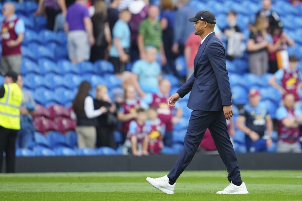 Burnley's head coach Vincent Kompany walks on the pitch at the end of the English Premier League soccer match between Burnley and Tottenham Hotspur at Turf Moor stadium in Burnley, England, Saturday, Sept. 2, 2023. (AP Photo/Jon Super)
