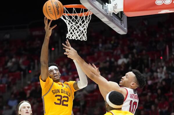 Arizona State forward Alonzo Gaffney (32) defends against Utah guard Marco Anthony (10) during the second half of an NCAA college basketball game Saturday, Feb. 26, 2022, in Salt Lake City. (AP Photo/Rick Bowmer)