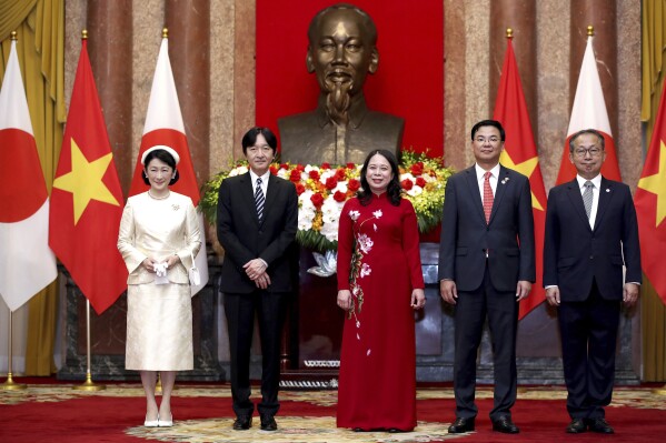 Japanese Crown Prince Akishino, second left, Crown Princess Kiko, left, and Vietnam's Vice President Vo Thi Anh Xuan, center, pose for a group photo at the Presidential Palace in Hanoi, Vietnam Thursday, Sept. 21, 2023. (AP Photo/Minh Hoang)