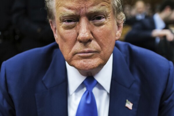 Former President Donald Trump appears at Manhattan criminal court before his trial in New York, Friday, May 3, 2024. (Charly Triballeau/Pool Photo via AP)