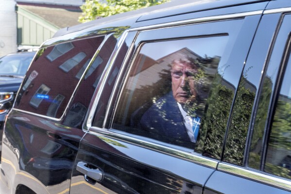 Former President Donald Trump arrives to the Capitol Hill Club, Thursday, June 13, 2024, in Washington. (AP Photo/Jacquelyn Martin)