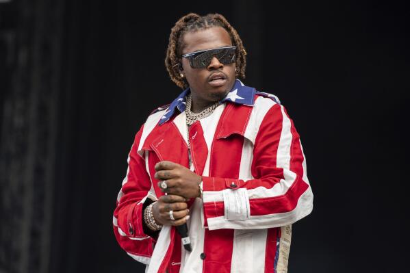 FILE - Gunna performs at the Wireless Music Festival, Crystal Palace Park, London, England, on Sep. 10, 2021. A judge in Atlanta on Thursday, July 7, 2022, denied bond for rapper Gunna, who's charged with racketeering along with fellow rapper Young Thug and more than two dozen other people. (AP Photo/Scott Garfitt, File)
